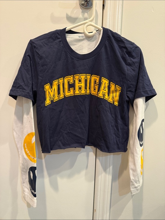 Bella Canvas Tops - Univ. of Mich. cropped Navy Tee layered over white waffle graphic long sleeve.